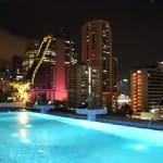 Admiral Premier Hotel rooftop pool at night