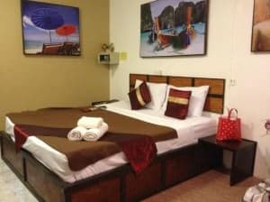 Rich Resort Beachside Hotel bed Lamai in room