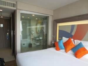 Novotel Bangkok Impact Hotel bedroom with view of batrhoom