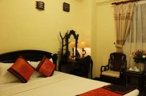 Lucky Hotel Hang Hom Street Hanoi bedroom with table