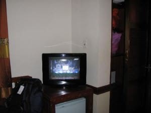 Prince Hotel Hang Giay Hanoi TV and fridge in room