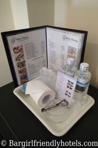@ White Patong Hotel room service menu and 2 free water bottles
