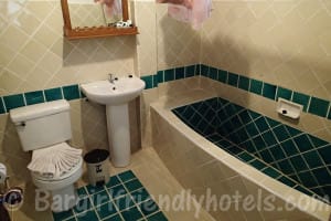 Bathroom and tub inside Bill Resort bungalow