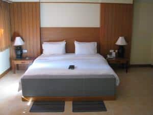 Palm Garden Hotel superior room bed corner