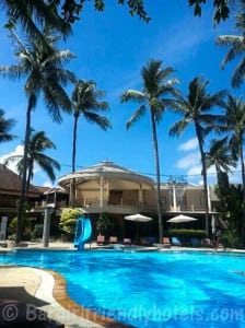 Swimming pool on a sunny low season day at the Coconut Village Resort