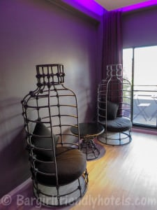 Bird caged themed chairs next to balcony in my room at the the Weekend Pattaya