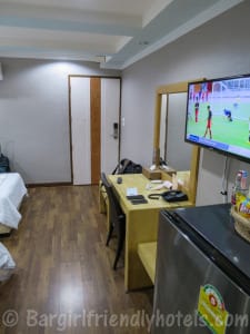 TV fridge and desk at he Beach Front Resort Pattaya