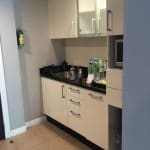 GM Suites kitchen in rooms