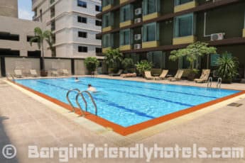 Nice quiet outdoor pool with sun loungers at https://www.agoda.com/dynasty-grande-hotel/hotel/bangkok-th.html?cid=1445603