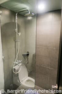 1st-class-toilet-and-walk-in-shower-facilities-in-rooms-of-the-amelie-hotel-manila
