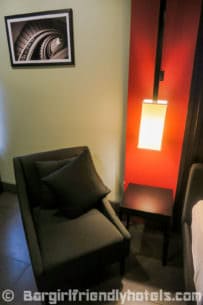 small-seat-to-watch-tv-from-inside-deluxe-rooms-at-amelie-hotel-manila
