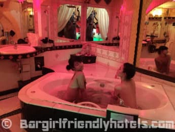 two-thai-bargirls-in-my-jaccuzi-in-the-party-patpong-rooms-of-the-penthouse-hotel-in-pattaya