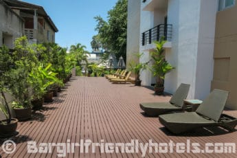 Deck with some loungers to take in the sun at August Suites Pattaya