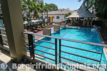 Deluxe Balcony room with direct view over the pool area in August Suites Pattaya